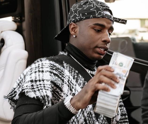 Pictures show Young Dolph killer Justin Johnson wearing a Pre Chain & showing the money he was paid to kill dolph