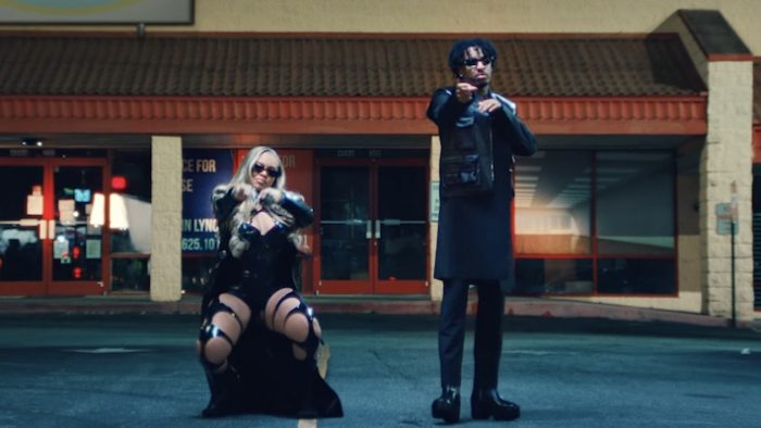 Latto Showboats And Pops A ‘Wheelie’ With 21 Savage In Their Boastful Video