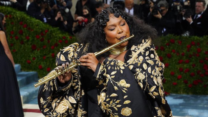 Lizzo Couldn’t Help But Play A $55K Flute On The 2022 Met Gala Red Carpet