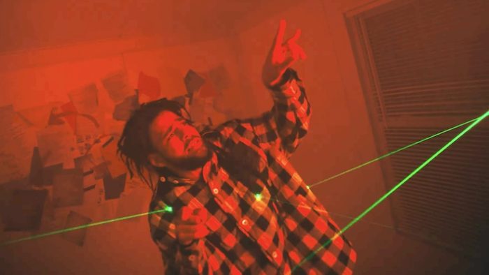 JID And J.Cole Take Aim, Spray, And Pray In Dreamville’s ‘Stick’ Video