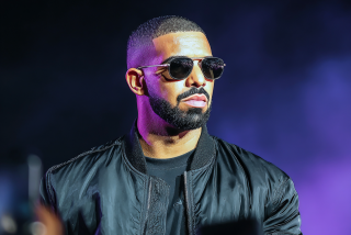 Drake Honors Sade With Towering 9-Foot Love Deluxe Sculpture